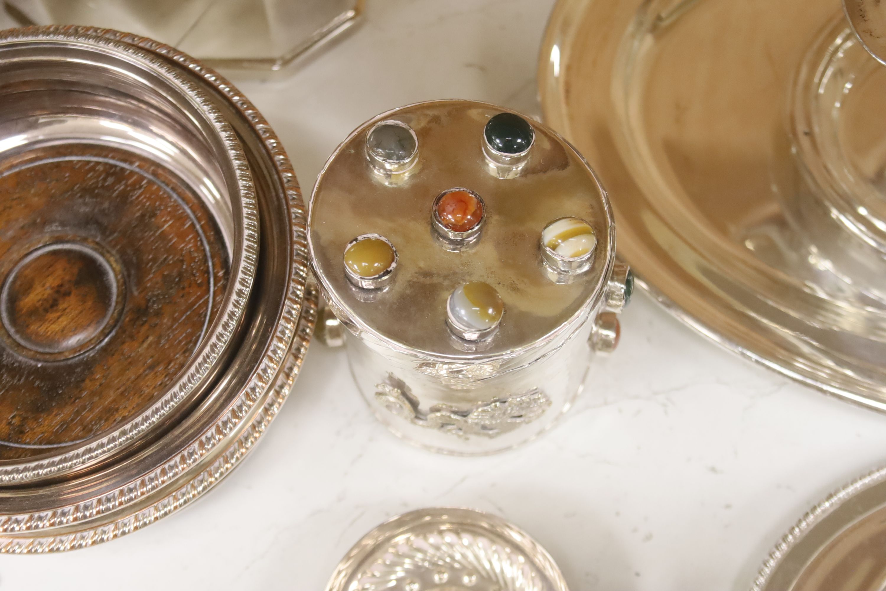 Various plated items, including a pair of rectangular entrée dishes and cover